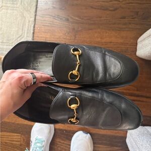 Gucci Black Leather Loafers with Gold Accents